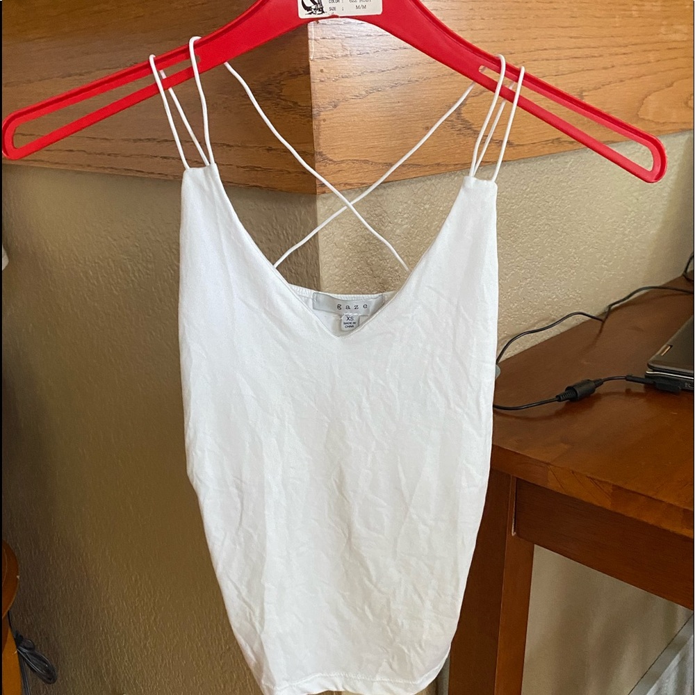size Xs white tank. no damage.
